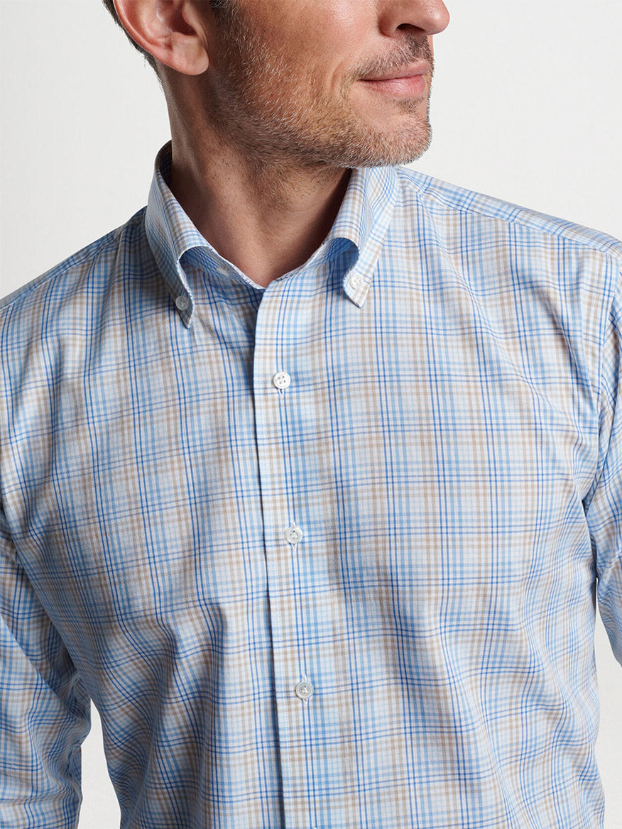Man wearing a Peter Millar Milo Cotton Sport Shirt in Blue Frost.