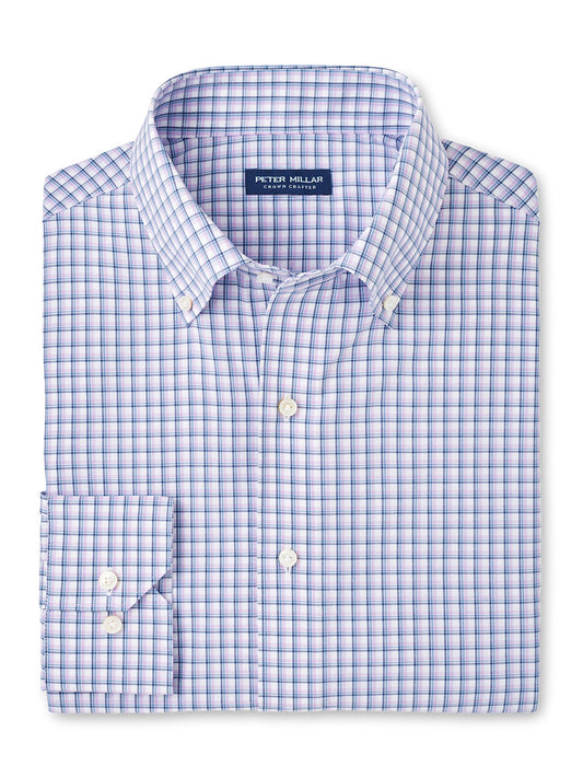 The Peter Millar Parker Performance Poplin Sport Shirt in Fountain Blue features a checkered pattern with blue, pink, and white hues. It has a button-down collar and a visible brand label inside, crafted from easy-care performance fabric for comfort and style on any occasion.