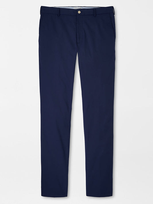 A pair of Peter Millar Raleigh Performance Trousers in Navy made from moisture-wicking performance fabric, displayed against a plain background.