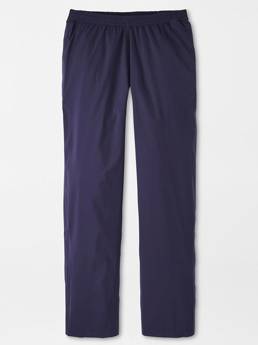 Straight-on view of the Peter Millar Shield Pull-On Rain Pant, navy blue performance fabric with an elastic waistband, displayed on a plain white background.
