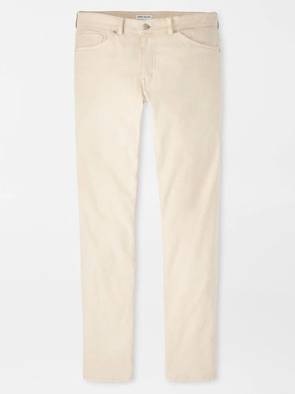 The Peter Millar Signature Sateen Five-Pocket Pant in Sand features a classic fit and two-way stretch fabric, with five pockets. Shown laid flat on a white background.