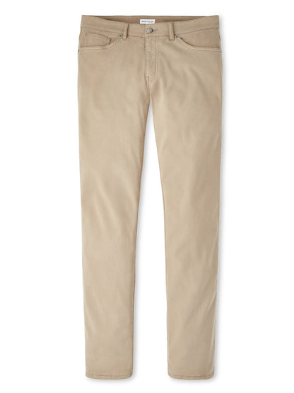 The Peter Millar Signature Sateen Five-Pocket Pant in Grain featured against a white background showcases light tan jeans with a classic five-pocket design, button, and zipper fly. These pants offer a lightweight feel and comfort waistband for everyday ease.