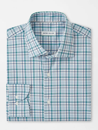The Peter Millar Simon Crown Lite Cotton-Stretch Sport Shirt in Windsor Blue is a folded, long-sleeve plaid twill shirt with blue, green, and white colors, a button-down collar, and a visible Peter Millar brand label.