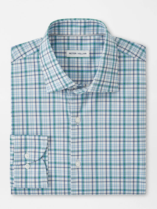 The Peter Millar Simon Crown Lite Cotton-Stretch Sport Shirt in Windsor Blue is a folded, long-sleeve plaid twill shirt with blue, green, and white colors, a button-down collar, and a visible Peter Millar brand label.