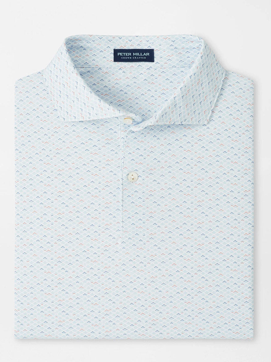 A neatly folded Peter Millar Soprano Waves Performance Jersey Polo in White features a collar, two buttons, four-way stretch comfort, and UPF 50+ sun protection.
