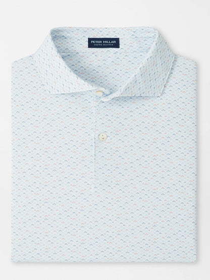 A neatly folded Peter Millar Soprano Waves Performance Jersey Polo in White features a collar, two buttons, four-way stretch comfort, and UPF 50+ sun protection.