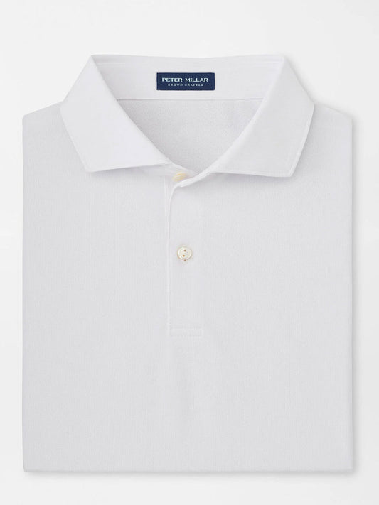 The Peter Millar Soul Performance Mesh Polo in White is a collared, two-button shirt made from wicking mesh fabric for breathable comfort, with the "Peter Millar" label inside the collar.