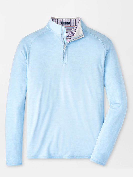 Peter Millar Stealth Performance Quarter-Zip in Blue Frost made from soft fabric displayed on a plain background.