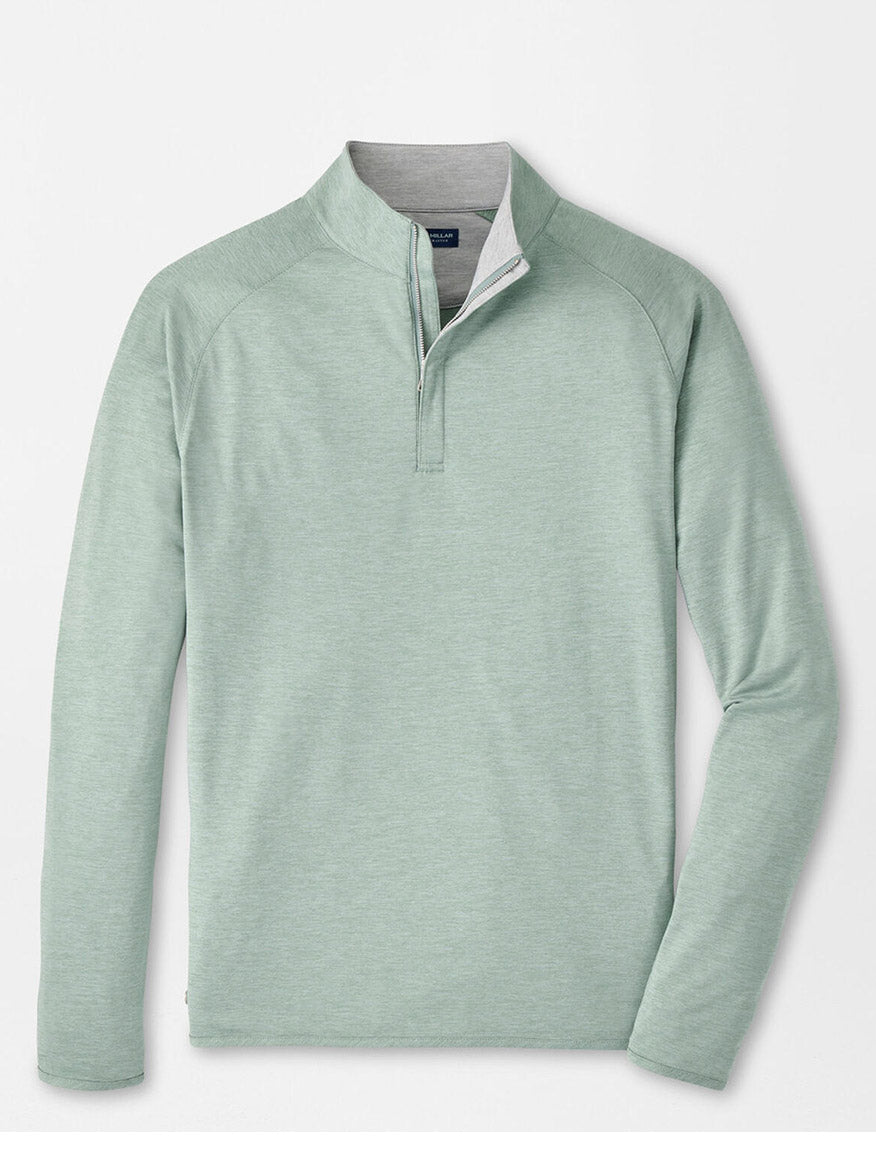 The Peter Millar Stealth Performance Quarter-Zip in Willow is a light green, lightweight pullover with a short stand collar, moisture-wicking fabric, and UPF 50+ protection, shown on a plain white background.