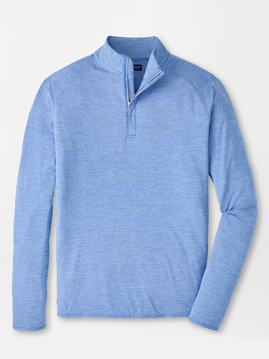 The Peter Millar Stealth Stripe Performance Quarter-Zip in Dusk Blue is a lightweight, long-sleeve shirt with moisture-wicking fabric, shown laid flat on a white background.
