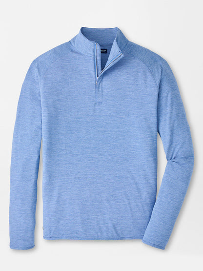 The Peter Millar Stealth Stripe Performance Quarter-Zip in Dusk Blue is a lightweight, long-sleeve shirt with moisture-wicking fabric, shown laid flat on a white background.