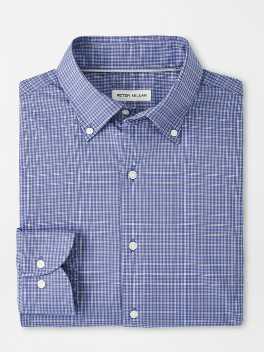 The Peter Millar Stowe Crown Lite Cotton-Stretch Sport Shirt in Deep Violet features a button-down collar, white buttons, and a "Peter Millar" label on the inside collar. Made from easy-care cotton-stretch fabric for effortless wear.