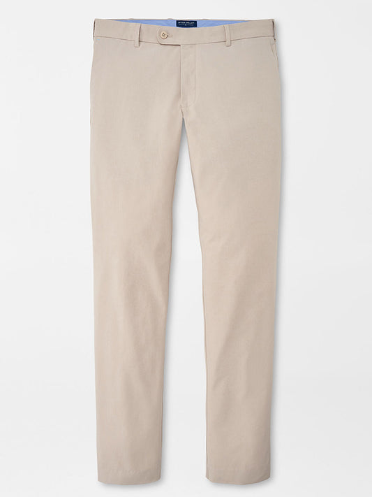 Peter Millar Surge Performance Trouser in Oatmeal on a plain background.