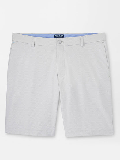 A pair of Peter Millar Surge Signature Performance Shorts in British Grey featuring water-resistant protection, displayed against a white background.