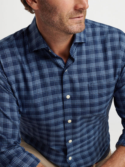 Man wearing the Peter Millar Thompson Summer Soft Cotton Sport Shirt in Galaxy, shown from shoulders to waist.