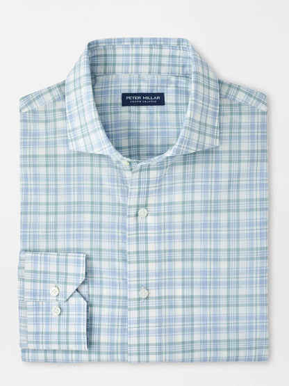 The Peter Millar Tropea Italian Poplin Sport Shirt in Light Willow is a neatly folded, long-sleeve plaid shirt in light blue, green, and white. Made from Italian cotton, it features a tailored fit, collar, and the signature Peter Millar label inside.