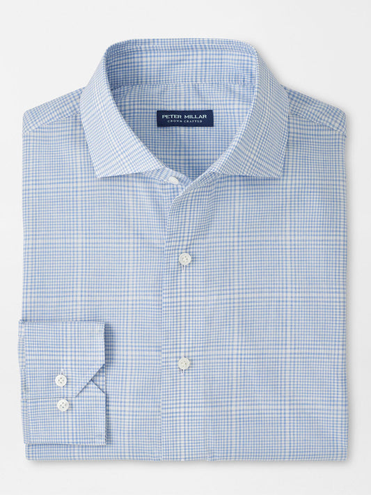 A neatly folded Peter Millar Urbino Italian Poplin Sport Shirt in Iris Mist, tailored fit with a spread collar and white buttons, crafted from fine Italian cotton and featuring the Peter Millar brand label inside the collar.