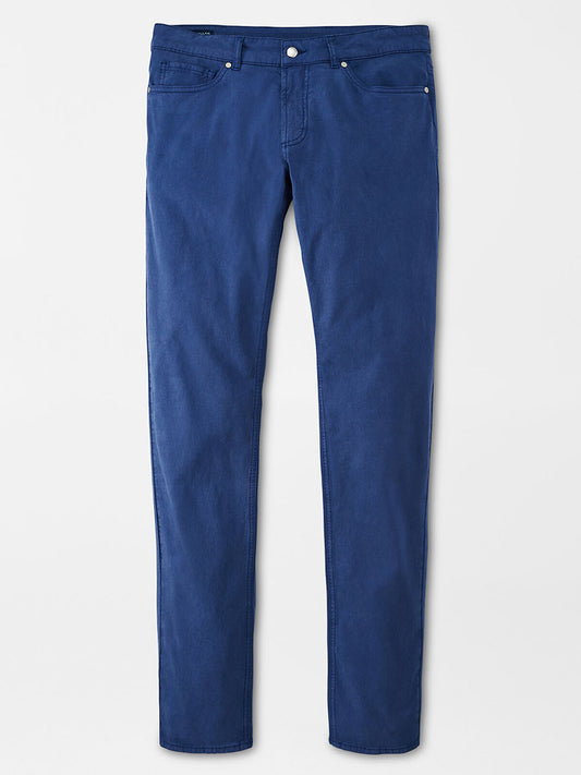 A pair of Peter Millar Wayfare Five-Pocket Pants in Riviera Blue displayed flat against a neutral background, offering a comfortable stretch.