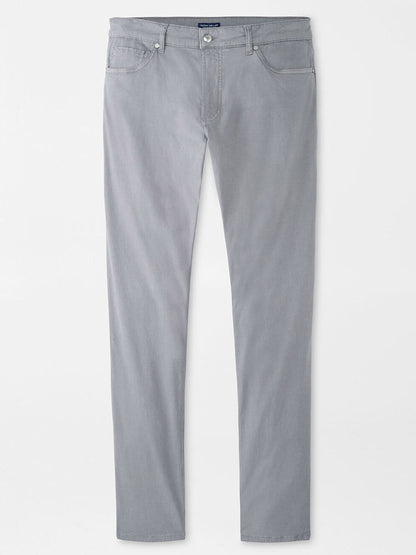 The Peter Millar Wayfare Five-Pocket Pant in Classic Grey features a slim fit, wrinkle-resistant fabric, classic five-pocket styling, and a button closure, shown laid flat on a white background.