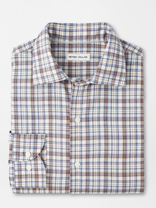The Peter Millar Waynesville Performance Flannel Sport Shirt in Winter Ivory features a blue, brown, and white plaid, crafted from performance fibers with a front pocket—perfect as your go-to fall shirt.