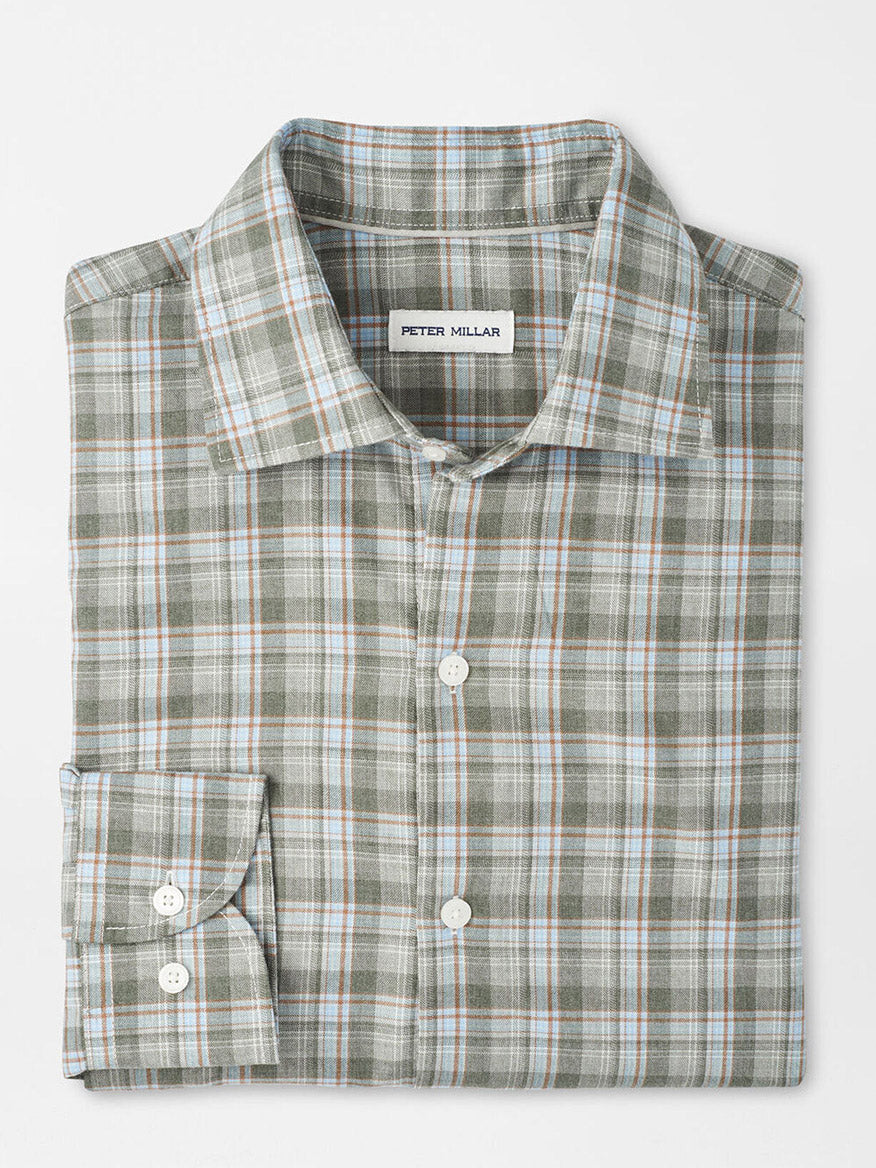 Neatly folded, the Peter Millar Whitecap Performance Flannel Sport Shirt in Basil—a green, blue, and white plaid button-up—features a classic fit and soft performance flannel from the Peter Millar flannels collection.