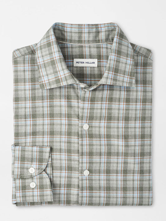Neatly folded, the Peter Millar Whitecap Performance Flannel Sport Shirt in Basil—a green, blue, and white plaid button-up—features a classic fit and soft performance flannel from the Peter Millar flannels collection.