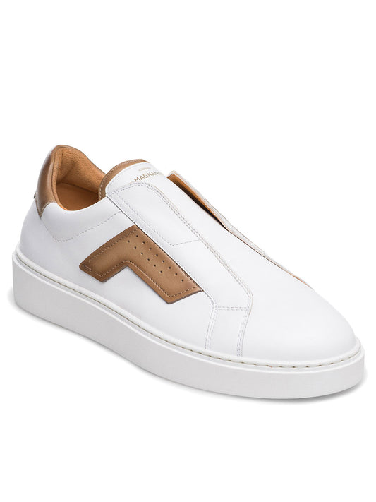 The Magnanni Phoenix Slip in White/Taupe is a unique slip-on sneaker with a white leather finish, featuring a hidden elastic gore system for easy wear. Tan accents and wing-inspired detailing enhance the thick white sole, while a brown zigzag design adds flair to this lace-less masterpiece.