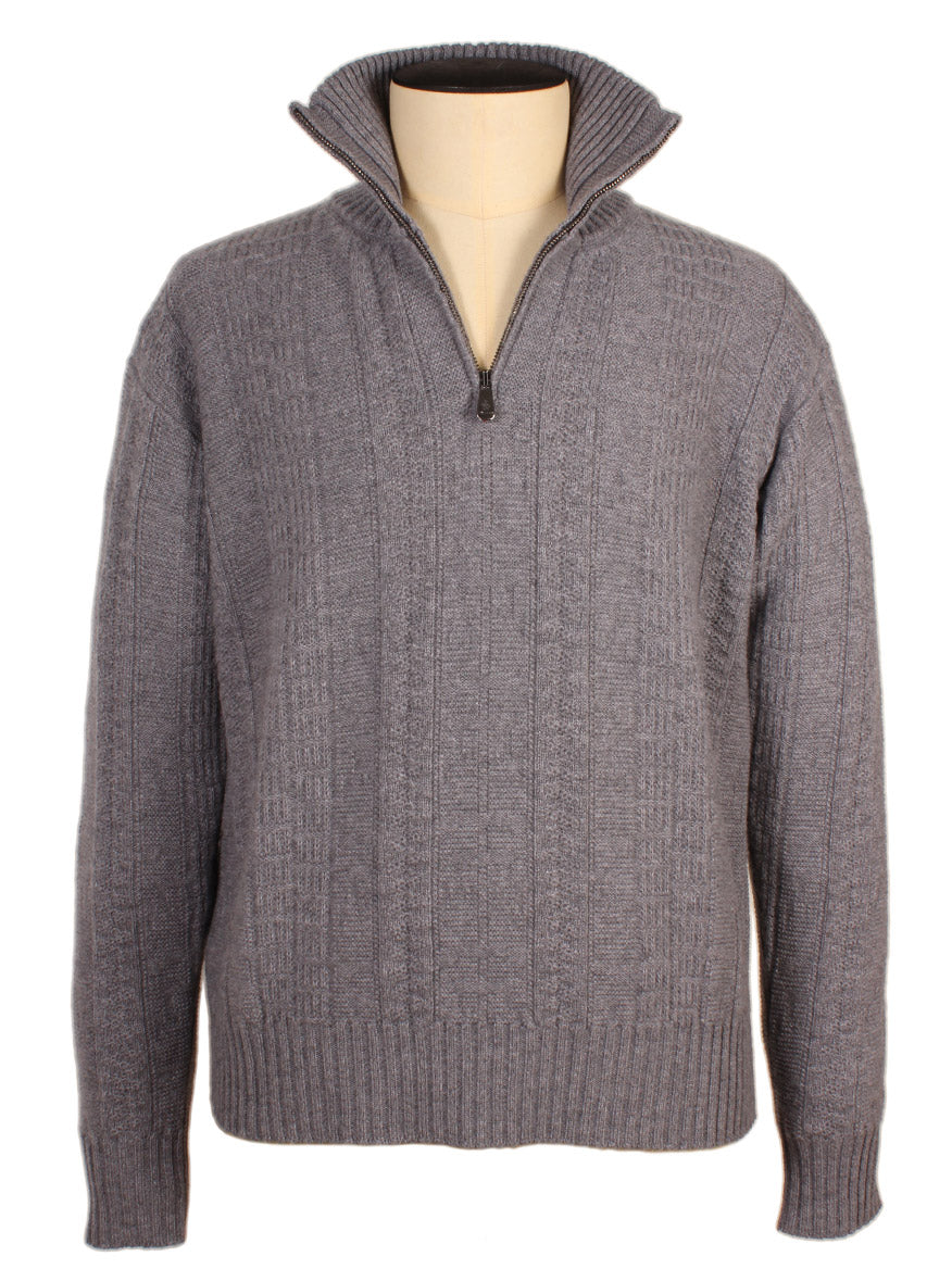 The Piacenza 1733 Cashmere Mock Neck Quarter Zip Sweater in Medium Grey, featuring long sleeves and a ribbed knit texture, is elegantly showcased on a mannequin.
