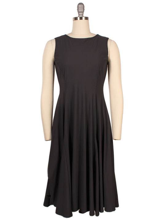 Sleeveless Porto Olivia Dress in Smoke, fit-and-flare midi style displayed on a dress form against a plain background, features subtle pintuck detailing for added elegance.