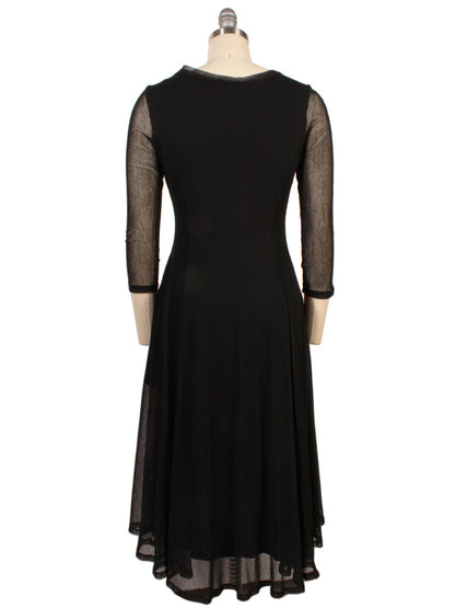 The Porto Pendulum Dress in Black is a knee-length mesh fit-and-flare dress with sheer three-quarter sleeves and a fitted bodice, shown from the back on a dress form.