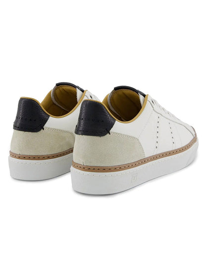 The Rubirosa AVA Sneakers in White are men's low-top leather sneakers featuring beige suede accents, black leather heel tabs, and white rubber soles, inspired by retro tennis shoes and displayed from the back.