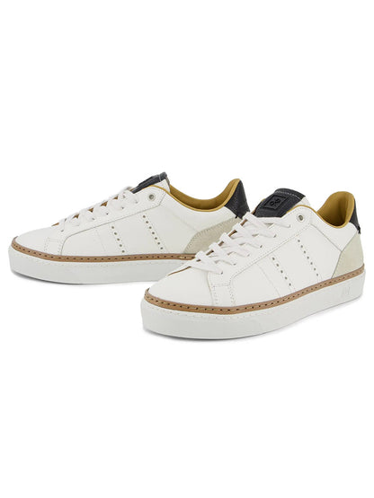 The Rubirosa AVA Sneakers in White are low-tops with beige and black accents, perforated sides, and thick white soles, offering a classic retro tennis shoe style.