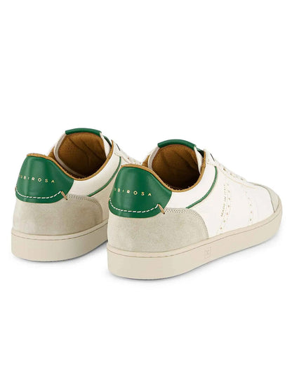 Handmade in Italy, the Rubirosa JUDY Sneakers in White/Green feature white leather, beige suede accents, and green heel tabs with "NIBIROSA" branding—perfect for sustainable fashion lovers.