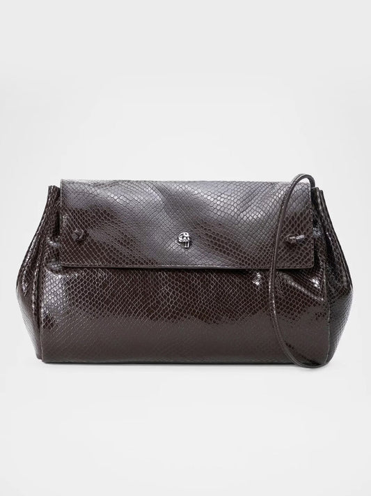 STAUD Cy Convertible Bag in Espresso Snake, a dark brown snake-embossed leather shoulder bag with a fold-over flap and a silver-tone emblem.