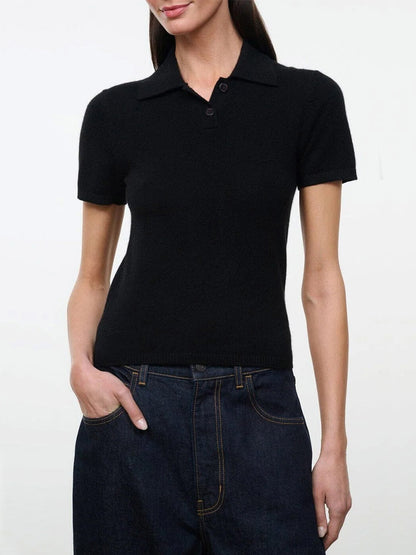 STAUD Gino Cashmere Polo Sweater in black, featuring a fitted design, short sleeves, and a buttoned collar.