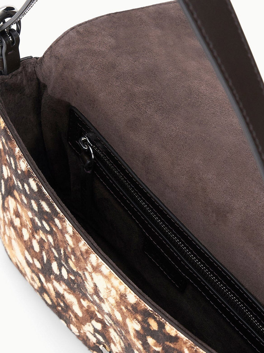 STAUD Harlow Bag in Fawn Haircalf shoulder bag with a patterned brown and tan exterior and a dark brown interior featuring a zippered pocket.