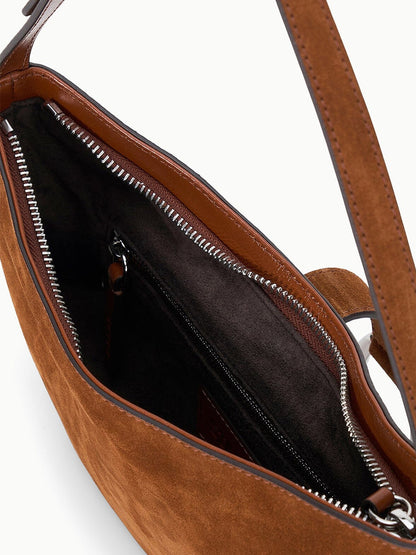 STAUD Harlow Crescent Shoulder Bag in Tabac shown open, featuring a silver zipper, black interior lining, and an inner zippered pocket, finished with the signature moon buckle.