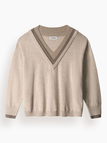 STAUD Norman Sweater in Sesame Multi: an oversized beige knit sweater featuring a V-neck with a triple-layer neckline and brown striped trim at the cuffs.