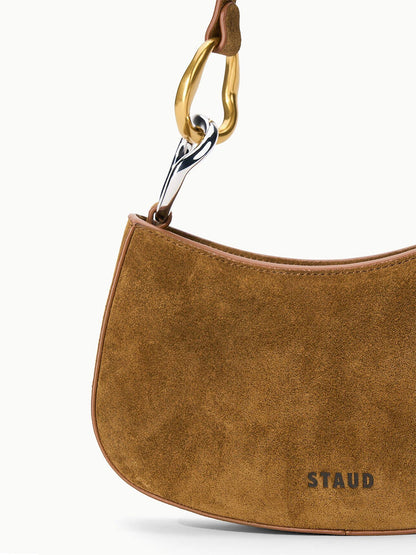 STAUD Ollie Bag in Cigar, a compact brown suede shoulder bag featuring a gold and silver-tone metal hardware link attachment.
