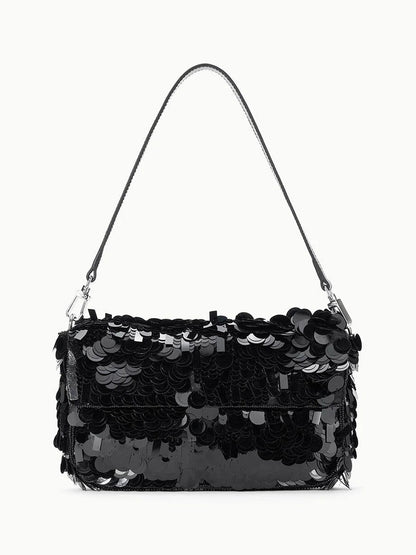The STAUD Timmy Shoulder Bag in Black features a rectangular shape, single strap, and is covered with large shiny sequins. Displayed against a plain white background.