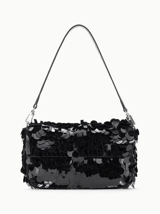 The STAUD Timmy Shoulder Bag in Black features a rectangular shape, single strap, and is covered with large shiny sequins. Displayed against a plain white background.