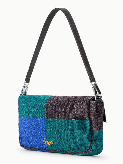 STAUD Timmy Shoulder Bag in Conch Shell: rectangular beaded design in teal, blue, and black patchwork, magnetic closure, black strap, and small gold STAUD logo on the front.