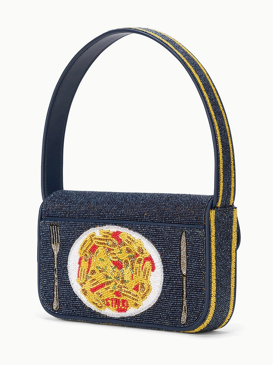 The STAUD Tommy Beaded Bag in Staudelloni is a limited-edition shoulder bag with a hand-beaded pasta plate design, crafted from blue and yellow vegan leather for a unique, eye-catching look.
