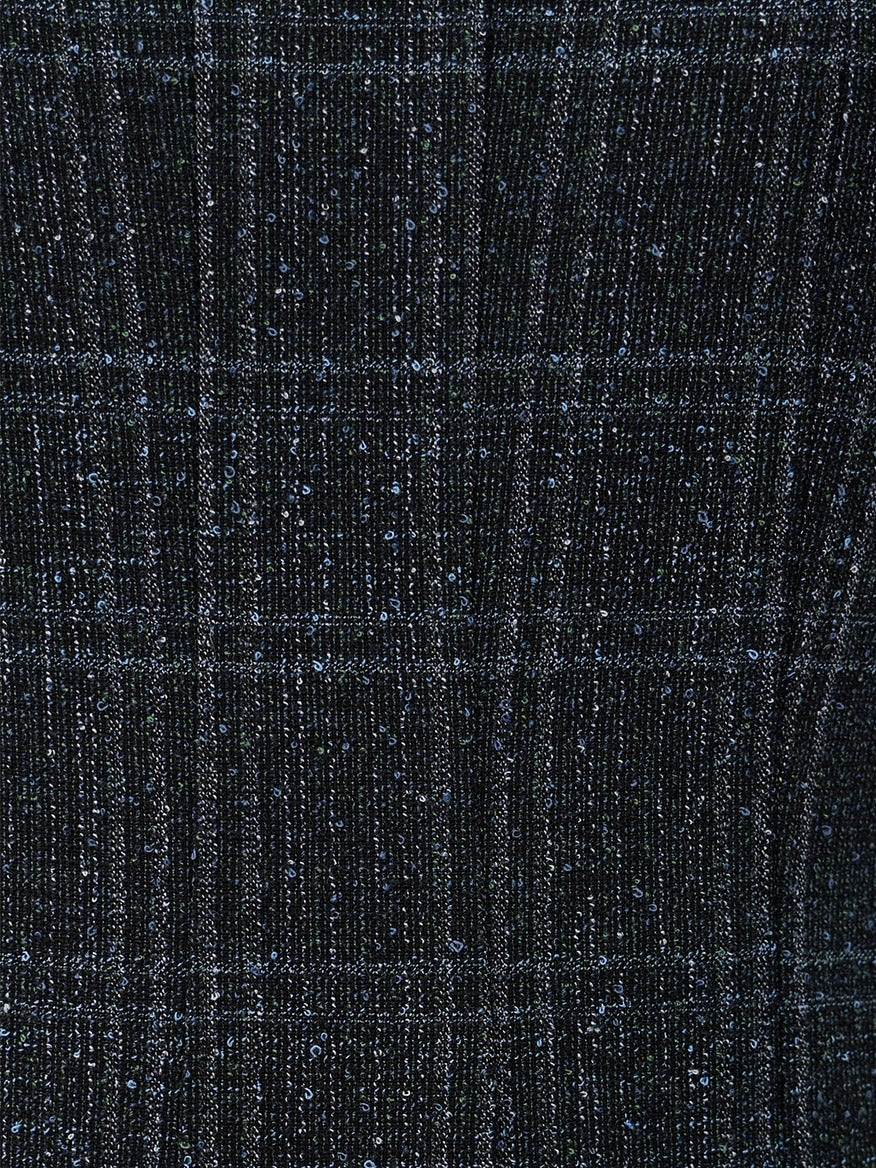 Close-up of the STAUD Wells Midi Sleeveless Dress in Ink Blue Plaid, featuring a dark blue checkered pattern with a subtle shimmering texture.
