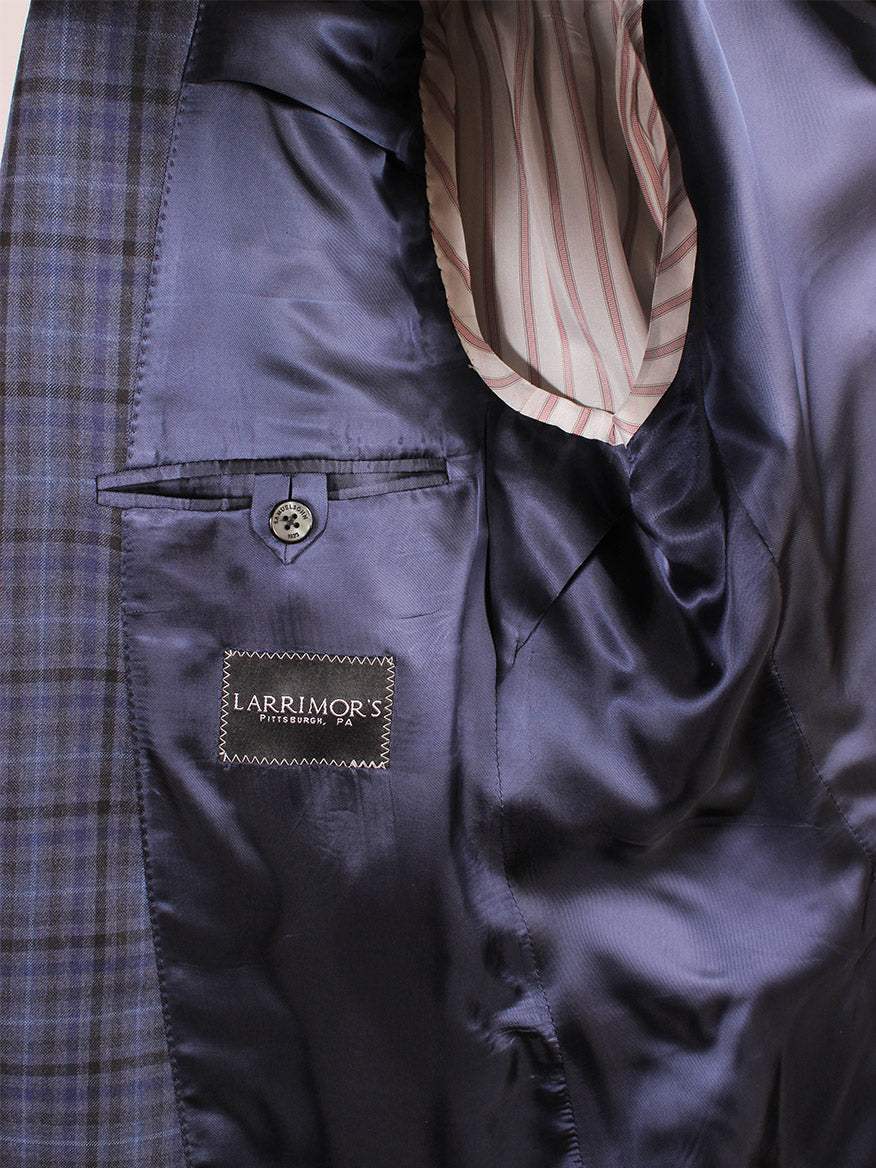 A close up of a Samuelsohn Bennet Sport Jacket in Blue & Black Plaid with a label on it.