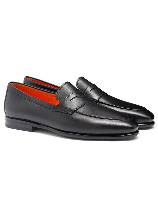 The Santoni Carlos Black Leather Penny Loafer, made in Italy, features premium black leather, a low heel, and orange inner lining, and is displayed side by side on a white background.