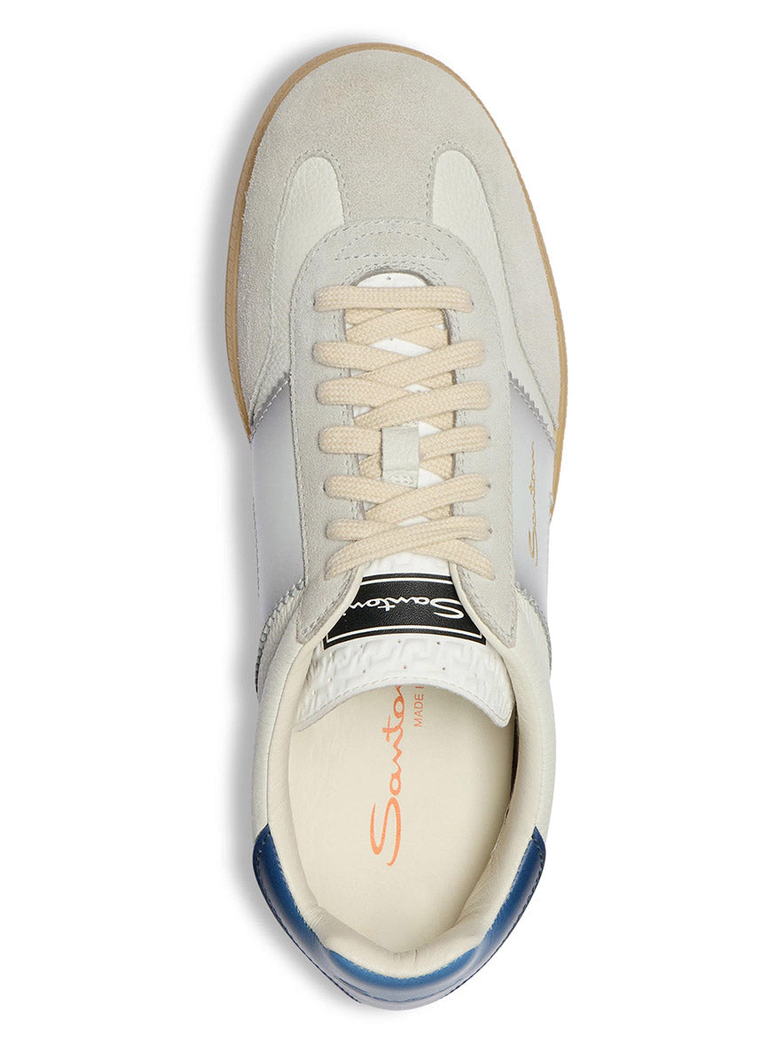 Top view of the Santoni Double Buckle Sneaker in White/Blue, a men's leather sneaker with white and beige tones, blue heel detail, double buckle accents, and "Santoni" branding on the insole and tongue.