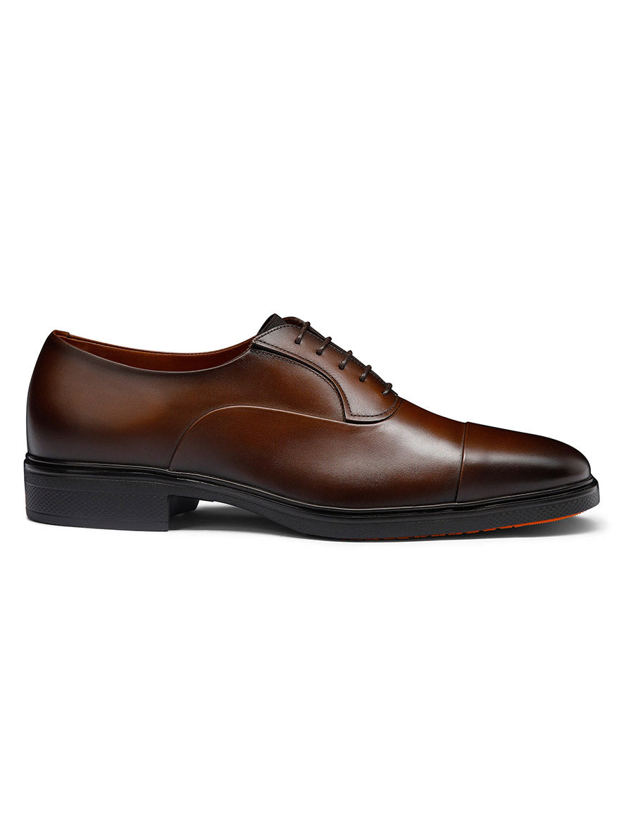 The Santoni Easy Lace-Up Oxford in Dark Brown features a cap toe, black sole, closed lacing, and Italian craftsmanship—shown in profile on a white background.