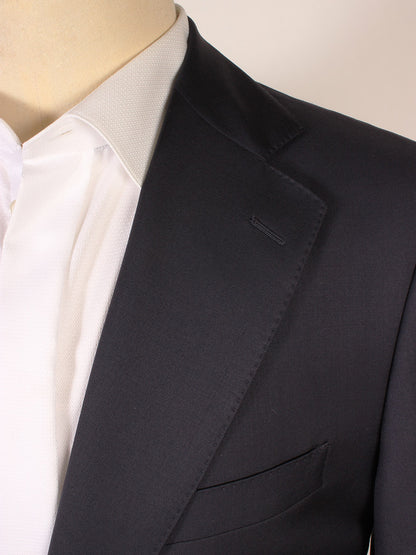 Close-up of a person wearing a white dress shirt and the Scabal Soho Navy Wool Blazer, showing the collar, lapel, and chest pocket.