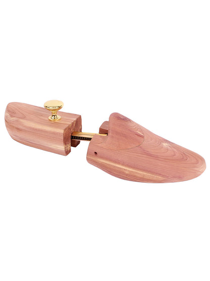 The Rochester Shoe Tree Company Washburn Shoe Tree is made in the USA from red aromatic cedar, featuring a brass knob and adjustable section to maintain your shoe’s shape.